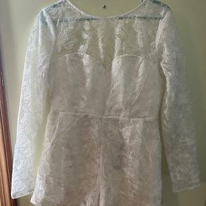 Lulus size L long sleeve white lace romper with pockets and open back